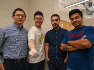 নিজের গবেষণা টিমের সাথে বিজ্ঞানী প্রমিত ঘোষ (সর্বডানে)