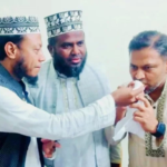 ভোটের লড়াই শেষে সৌহার্দ্য, বিএনপি প্রার্থীকে মিষ্টি মুখ করালেন আমির হামজা