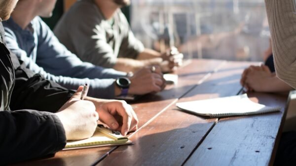 Business meeting, illustrative photograph by Dylan Gillis / Unsplash